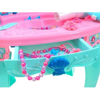 pełen zestaw akcesoriów dołączonych do toaletki dla dzieci