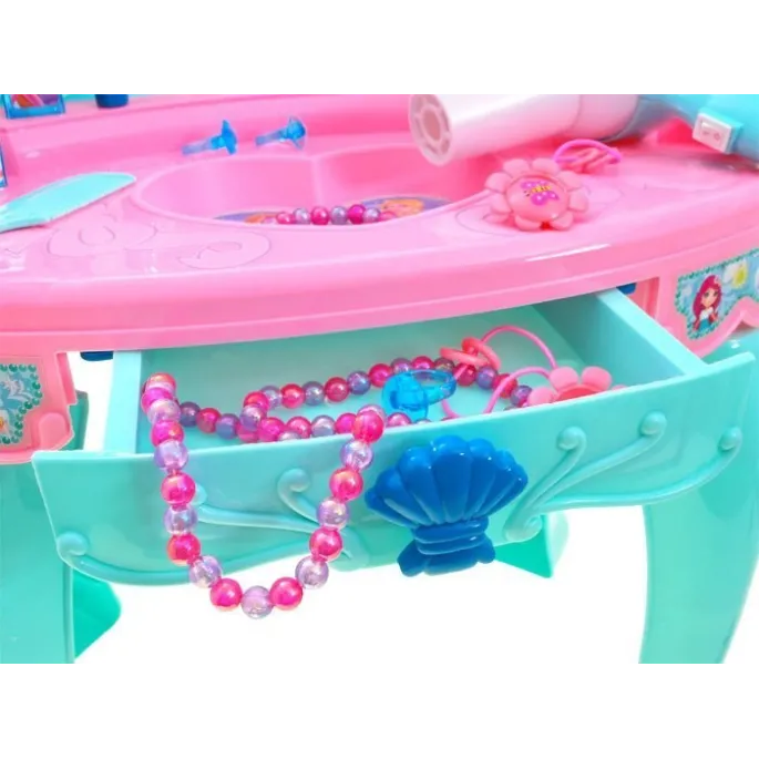 pełen zestaw akcesoriów dołączonych do toaletki dla dzieci