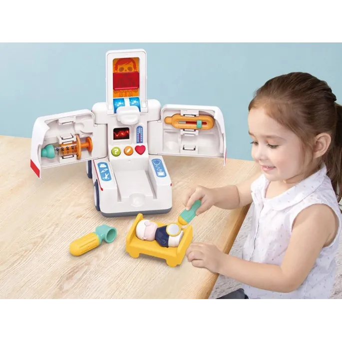 Widok boczny ambulansu z otwartym wnętrzem oraz akcesoriami