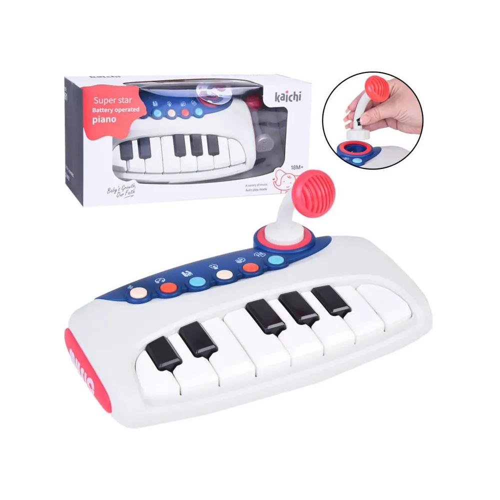 interaktywne pianinko z mikrofonem na białym tle