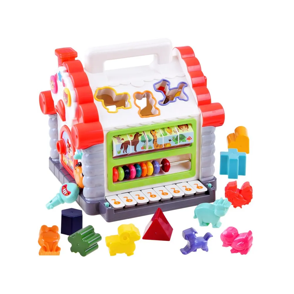 Interaktywny domek edukacyjny z widocznymi otworami sortera i klockami