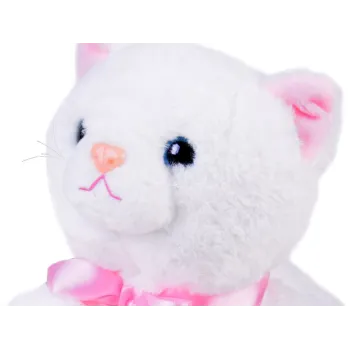 widok pluszowego kotka podczas wykonywania akrobatycznego ruchu