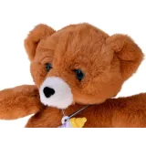 miękki interaktywny miś podczas zabawy z dzieckiem