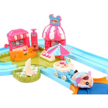 miękki chomik na torze wśród miniaturowych deserów lodowych