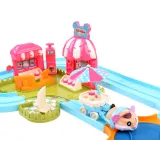 miękki chomik na torze wśród miniaturowych deserów lodowych