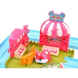 zbliżenie na akcesoria lodziarni, szyld oraz witrynę z atrapą lodów