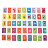 cztery kolorowe pionki obok planszy do gry Małe Kalambury