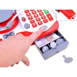 waga sklepowa obok kasy fiskalnej