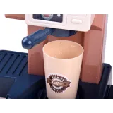 Elementy akcesoriów: portafilter, dzbanuszek na mleko i banknoty