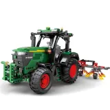 Zbliżenie na zieloną kabinę traktora z dużymi gumowymi kołami