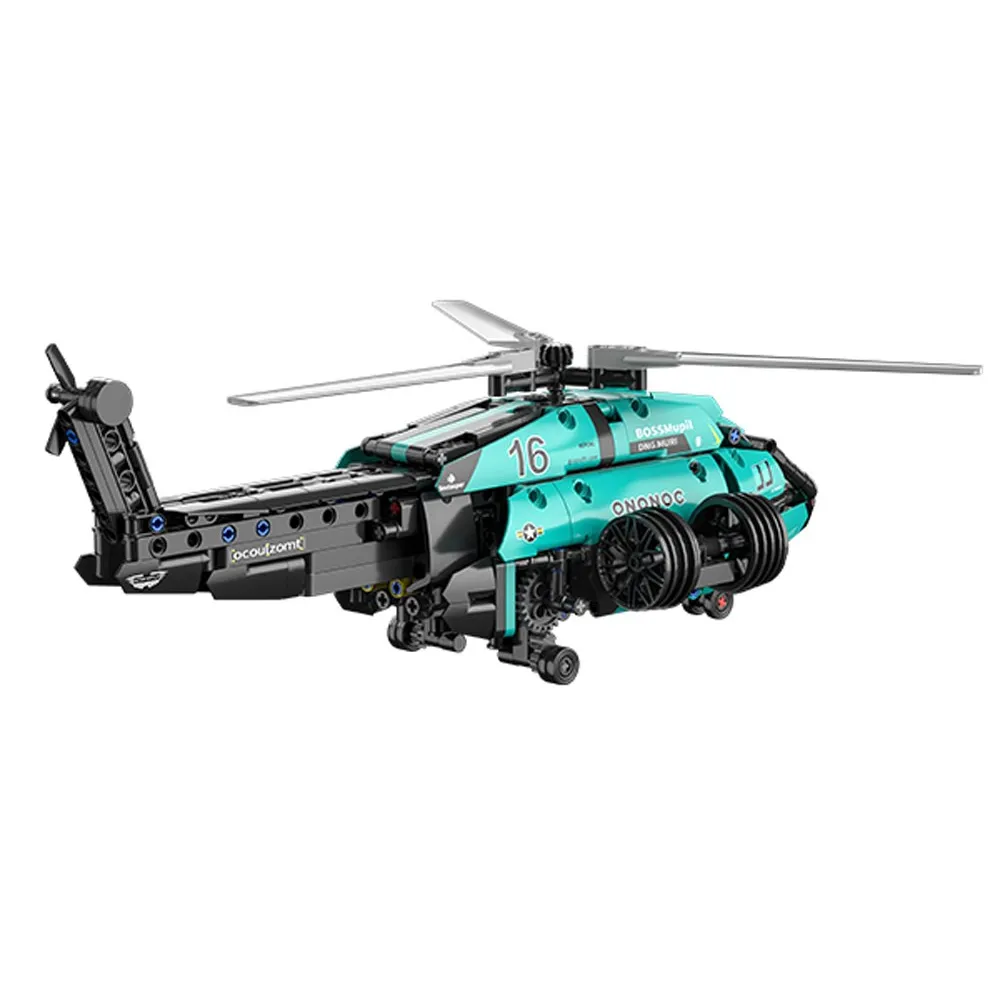 widok klockowego helikoptera z gumowymi oponami i naklejkami