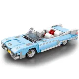 Zbliżenie na rozbudowaną maskę modelu samochodu z lat 50.