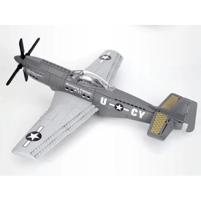 Elementy zestawu klocków przed złożeniem w model samolotu