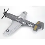 Elementy zestawu klocków przed złożeniem w model samolotu