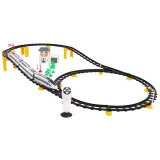 Zbliżenie na lokomotywę i wagony kolejki na torze