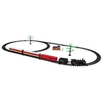 kolejka z odgłosami i dymem z widoczną lokomotywą na trasie