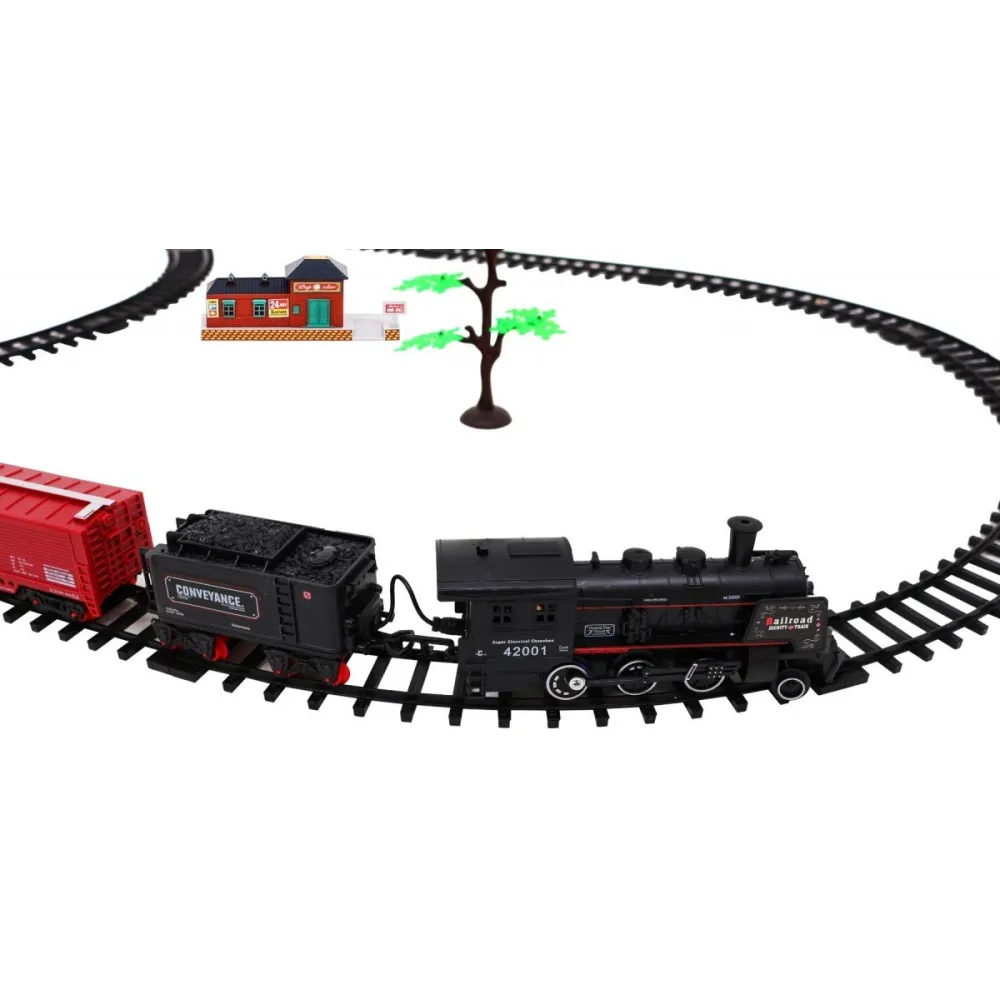 zbliżenie na lokomotywę wydobywającą dym podczas jazdy