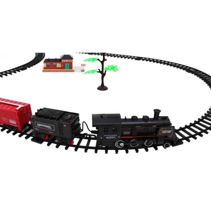 zbliżenie na lokomotywę wydobywającą dym podczas jazdy