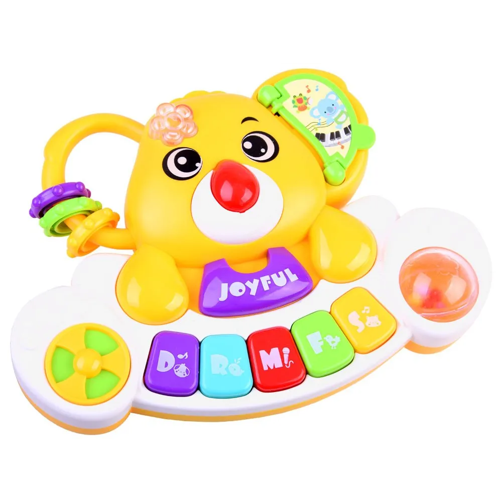 zbliżenie na klawisze pianinka dziecięcego z kolorowymi oznaczeniami