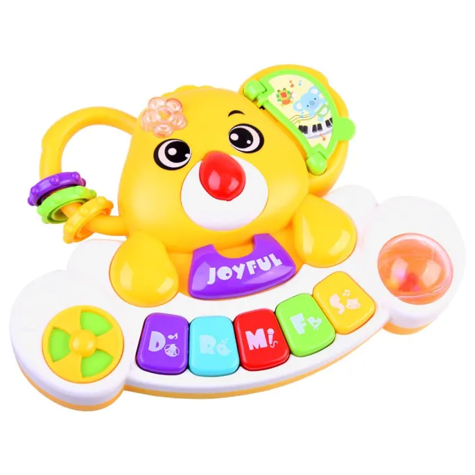 zbliżenie na klawisze pianinka dziecięcego z kolorowymi oznaczeniami