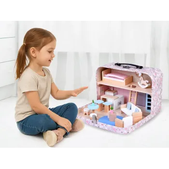 Przenośny domek dla lalek rozłożony do zabawy na stole