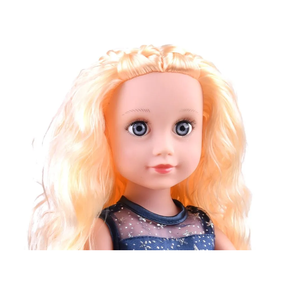Lalka z długimi blond włosami i szczotką do czesania