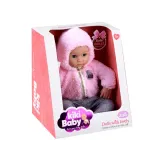 Szczegół ubrania lalki z kapturem i kolorowymi kropkami