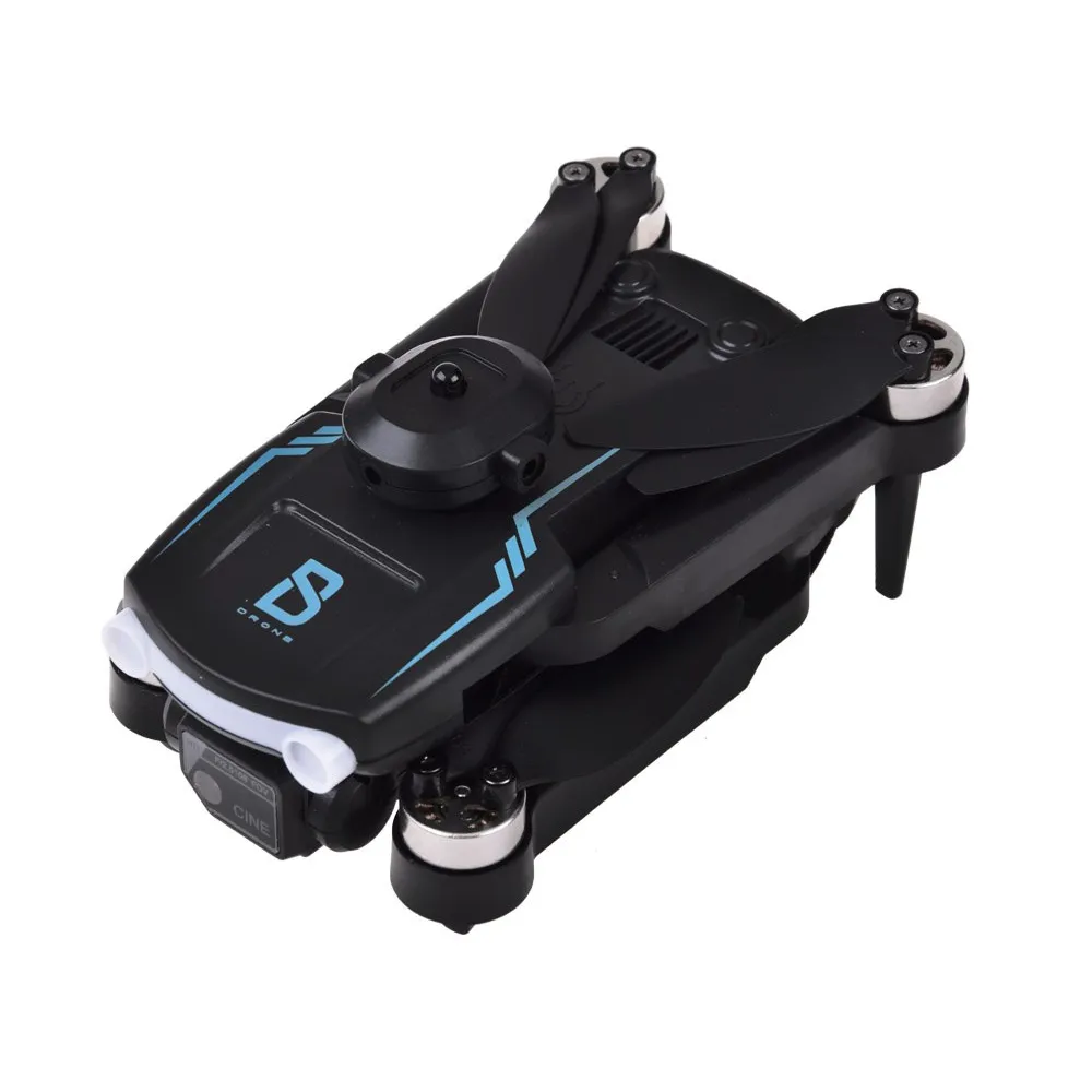 Dron RC0657 w pozycji startowej na podłodze w pomieszczeniu