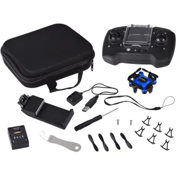 mini dron rc0656 w trybie lotu na tle zieleni