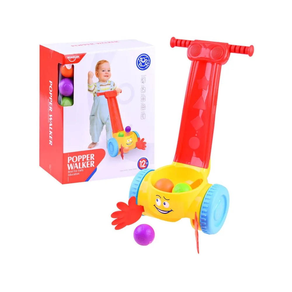 muzyczny łapacz piłek pchacz z kolorowymi kulkami na jasnym tle