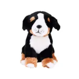 Pluszowy piesek berneński prezentowany w pozycji siedzącej z widocznym detalem