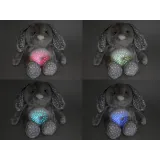 pluszowy króliczek projektor na łóżeczku dziecka