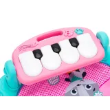 zestaw mata, pałąk z zawieszkami i lusterko na tle jasnej powierzchni