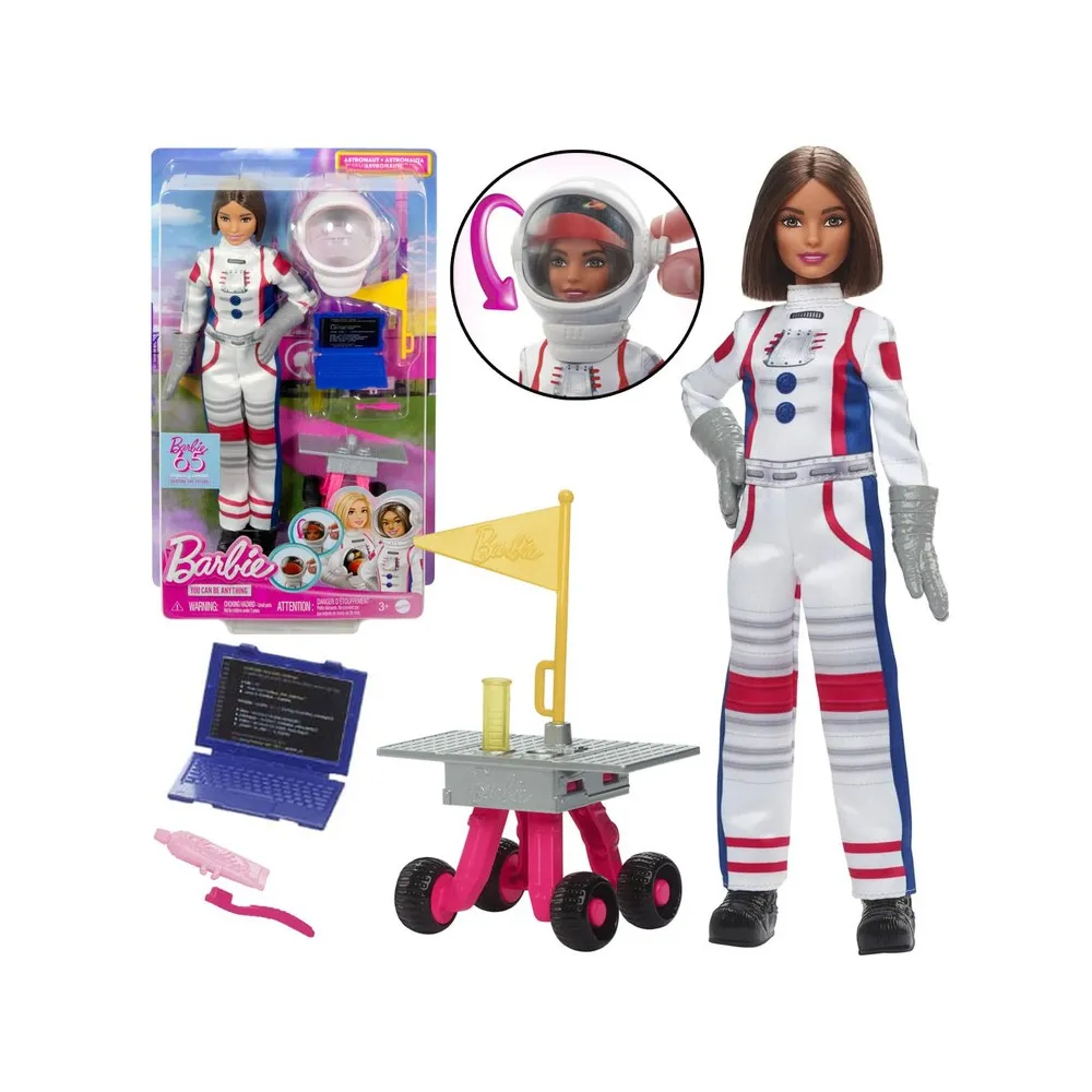Barbie Astronautka w pełnym stroju z akcesoriami na tle kosmicznym