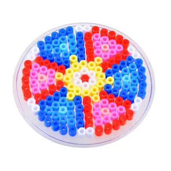 Akcesoria do zestawu: pęsety i papier pergaminowy na zdjęciu