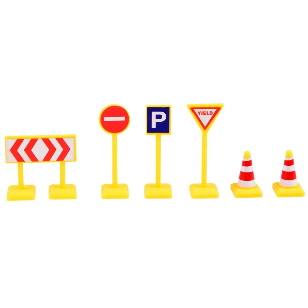 komplet pojazdów i znaków drogowych ułożony obok siebie