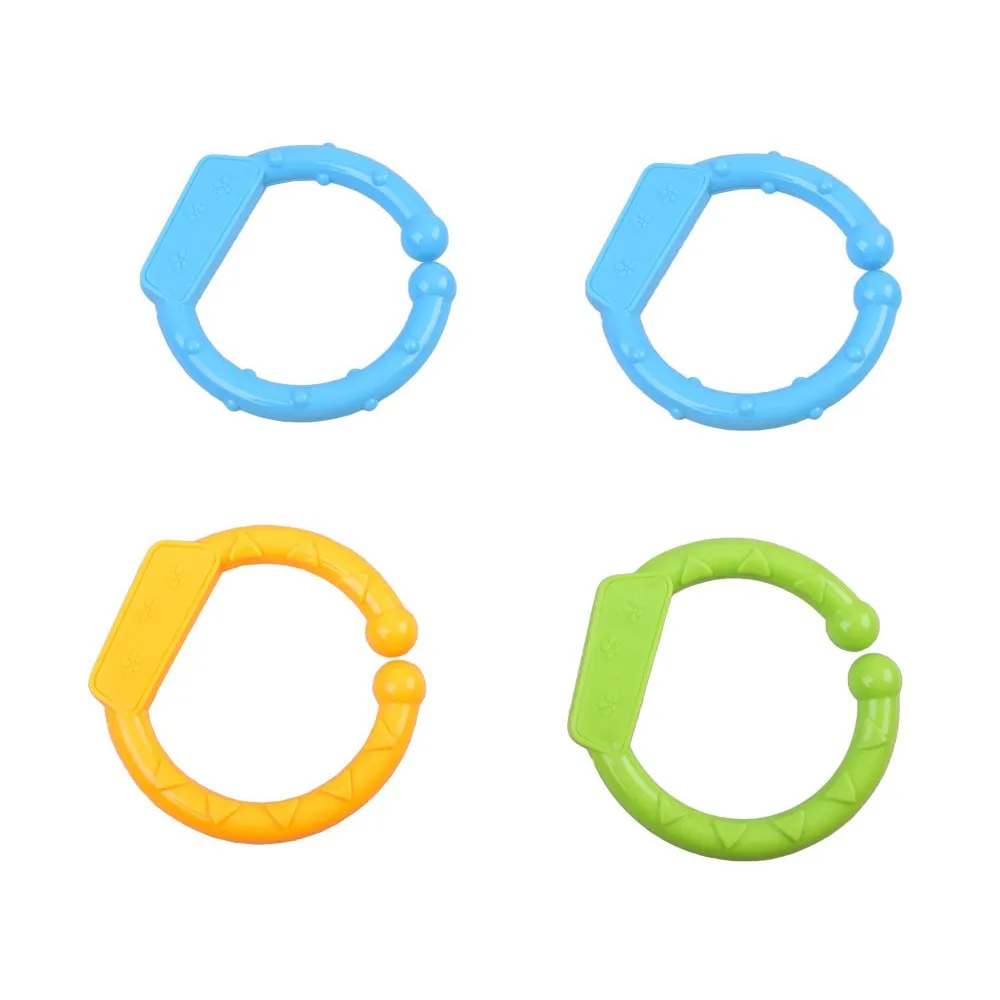 Odpinany pałąk z zabawkami i miękką chmurką na macie