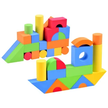 różnobarwne klocki piankowe ułożone w wieżę przez dziecko