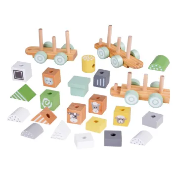 dwa wagoniki z kolorowymi klockami w różnych kształtach