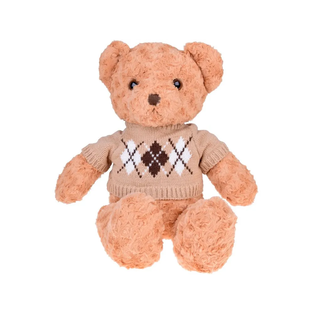 miś pluszowy prezentowany w całości na tle dziecięcego pokoju