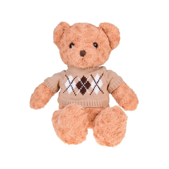 miś pluszowy prezentowany w całości na tle dziecięcego pokoju