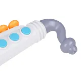 Detal ustnika i przycisków zabawkowego saksofonu