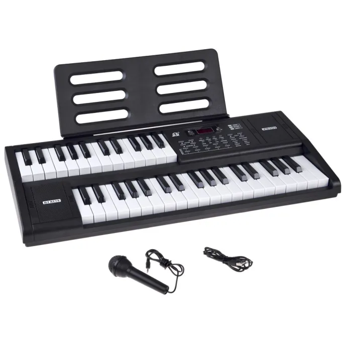 zestaw klawiszy keyboardu oraz detal obudowy bocznej