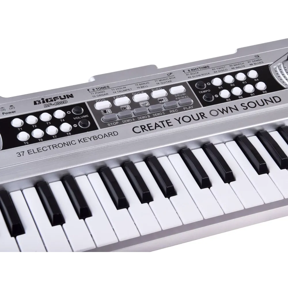 detal antypoślizgowej podstawy srebrnego keyboardu zabawkowego