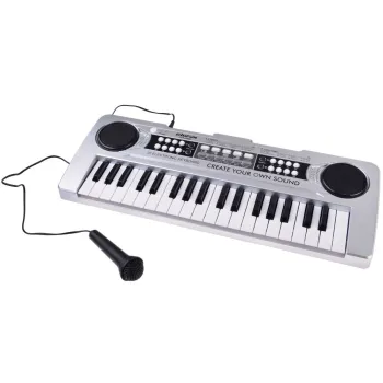 zestawienie akcesoriów: mikrofon, kabel usb i kabel aux in obok keyboardu