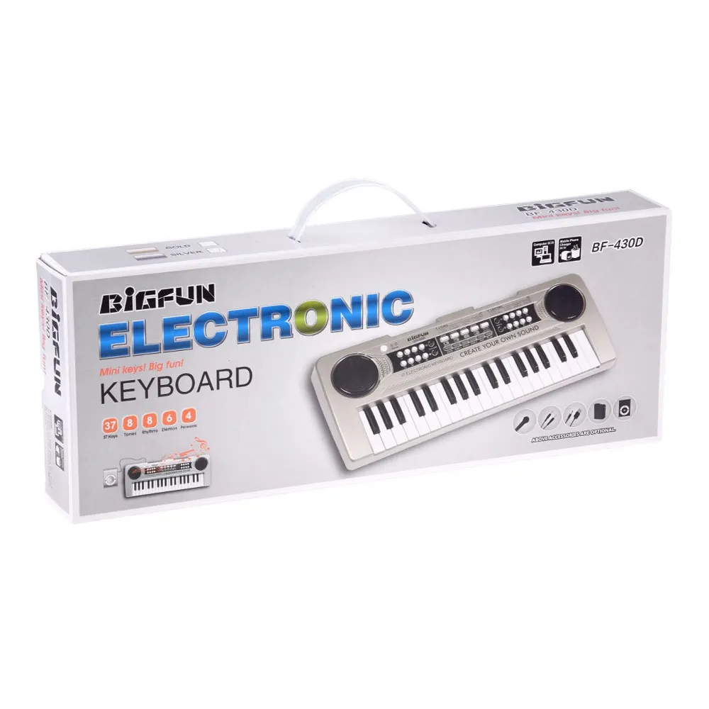 mini keyboard dziecięcy srebrny 37-klawiszy w aranżacji domowej