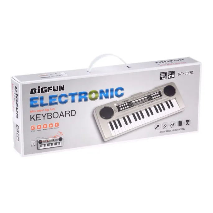 mini keyboard dziecięcy srebrny 37-klawiszy w aranżacji domowej