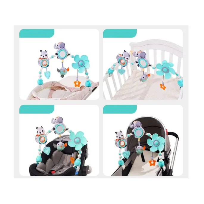 pałąk z zawieszkami w łóżeczku dziecięcym w jasnych barwach