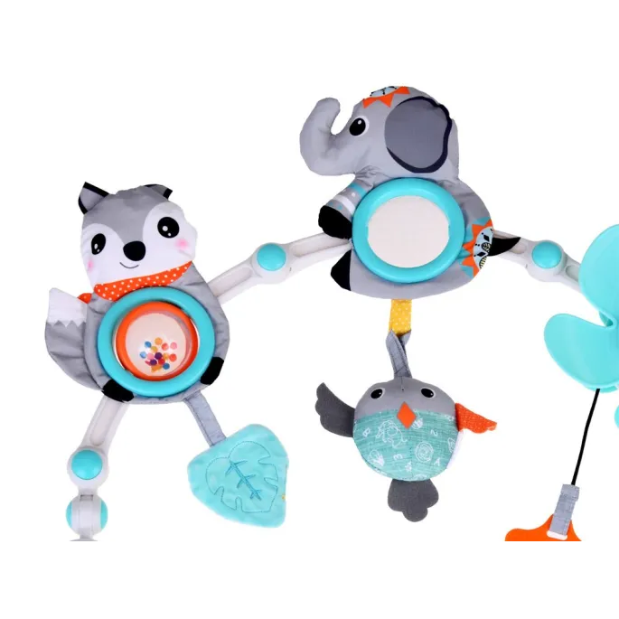 montaż zawieszki do łóżeczka za pomocą elastycznych klipsów