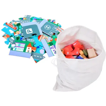 pojazdy z ruchomymi kołami ustawione na planszy miasteczka